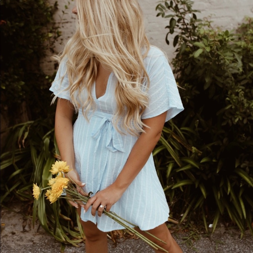 Light blue flowy open back mini dress